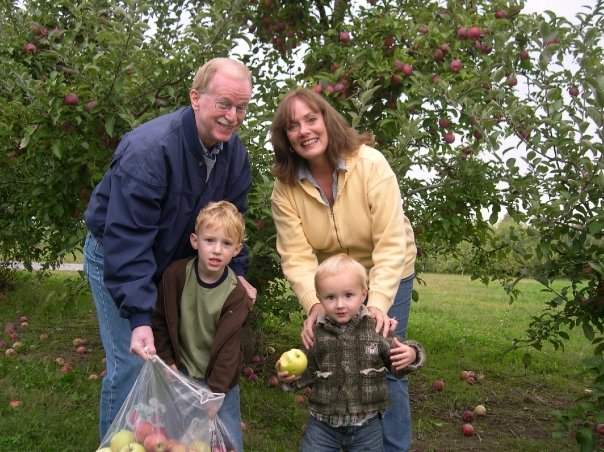mom and dad apple picking