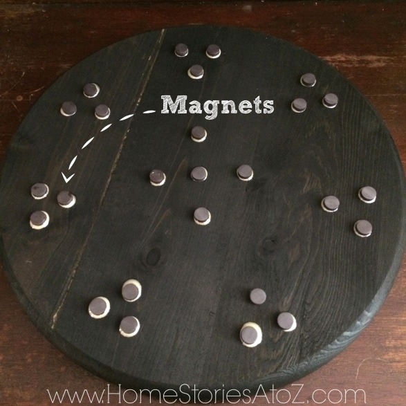Glue magnets to lazy susan for easy container removal.
