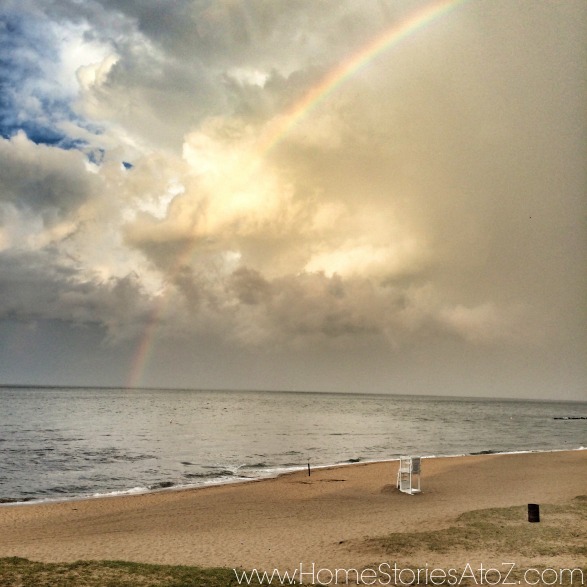 rainbow over beach and bay