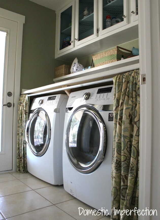 front-loading-washer-and-dryer-with-counter-and-curtains