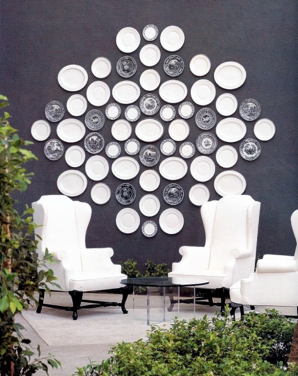 White plates on black wall. Kelly Wearstler Viceroy Hotel