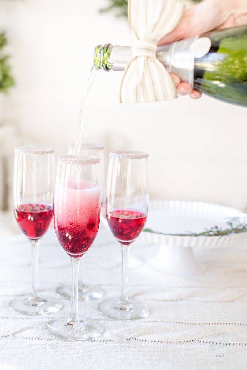 Holiday Drink Recipes - Pomegranate Champagne Cocktail by Home Stories A to Z