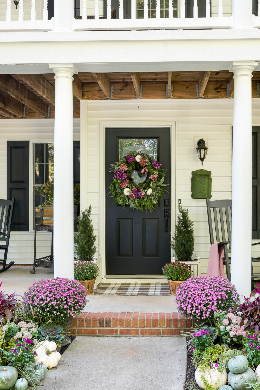 pink purple fall porch mums and decor