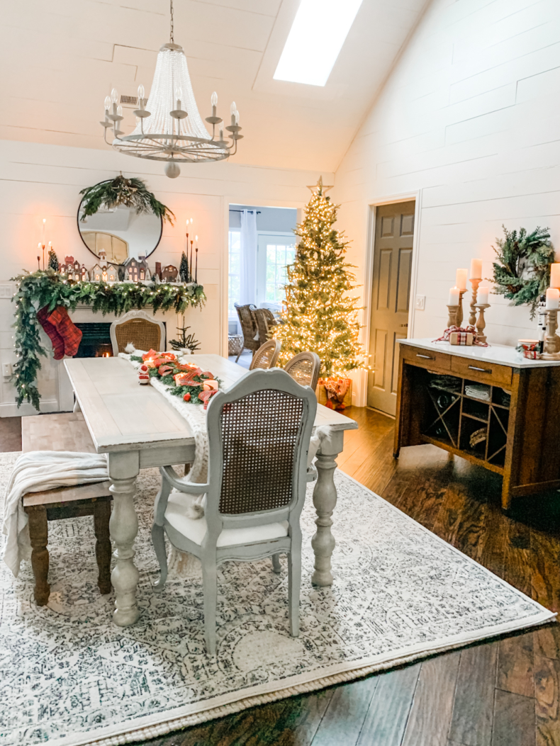 Cozy Traditional Christmas Decor in Dining Room: Christmas Village Mantel