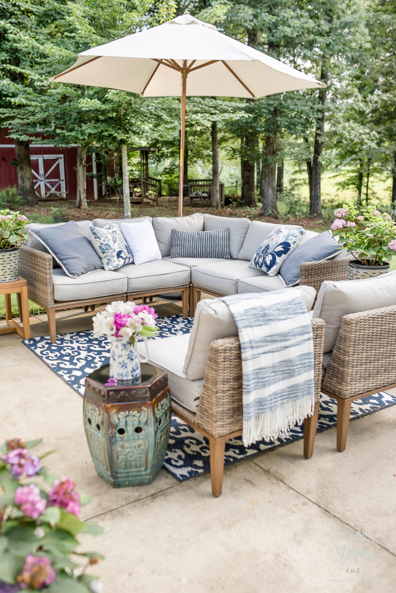 Neutral Summer Decor - Outdoor Dining in Blue by Home Stories A to Z